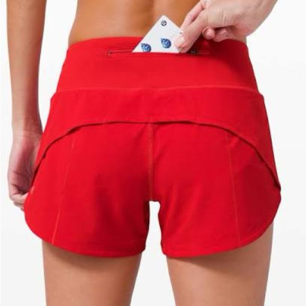 Lulu red speed up mid rise shorts size 6
